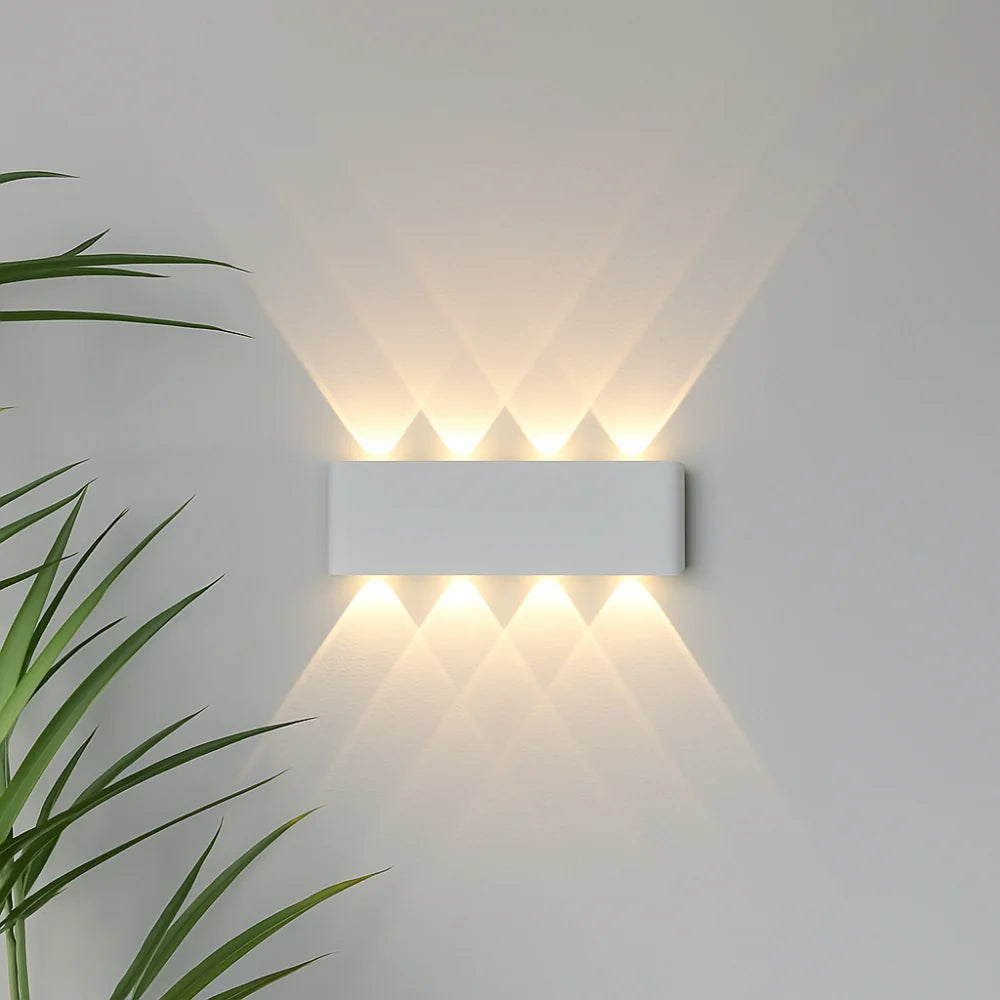 Modern wall light – stylish indoor and outdoor sconce in black or white
